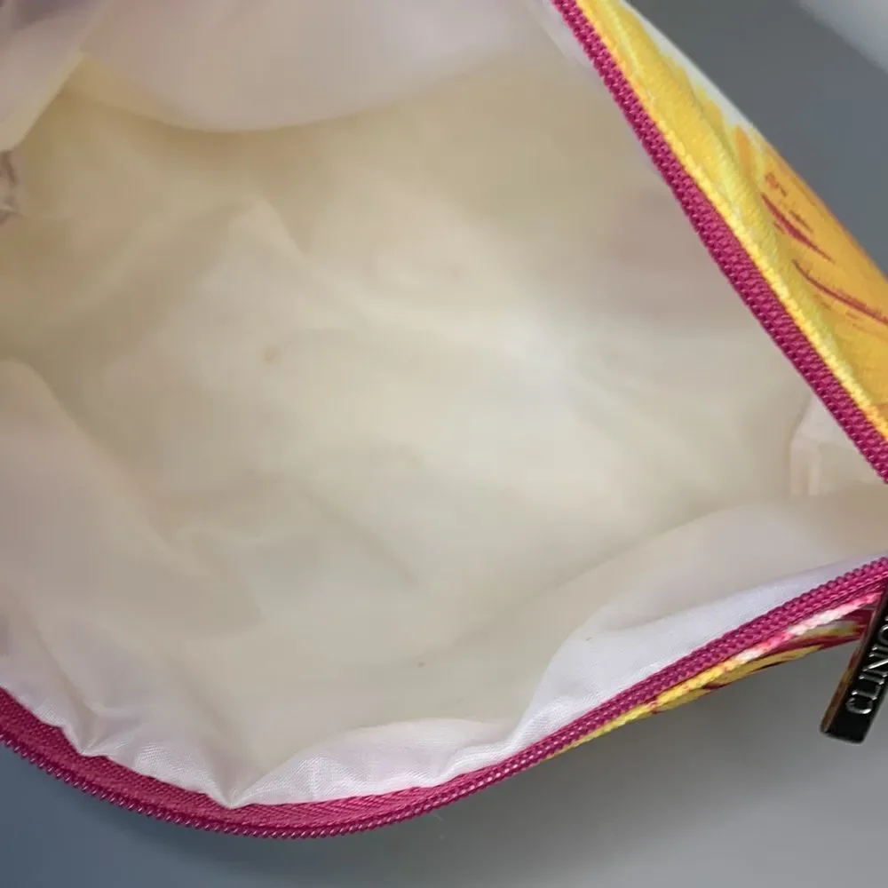 EUC Clinique LaLa DK makeup bag